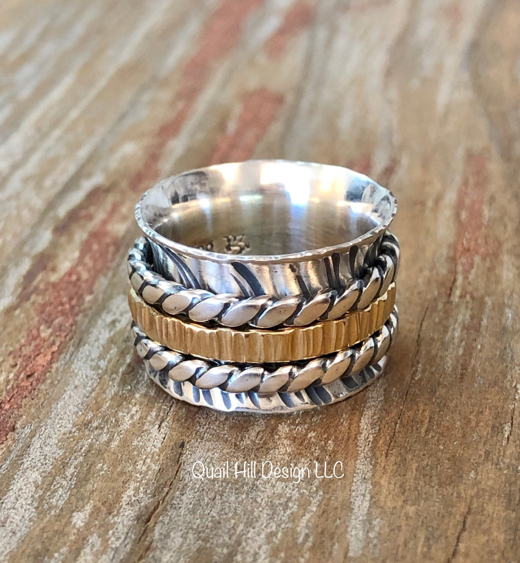 "sterling silver spinner rings"