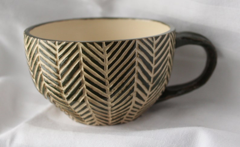 Handmade Pottery Mug With Abstract Carved Palm Leaf Texture