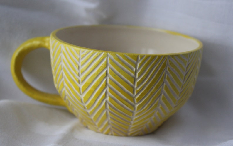 Handmade Pottery Mug With Abstract Carved Palm Leaf Texture