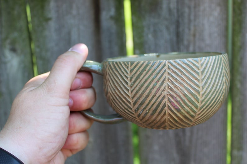 Handmade Pottery Mug With Abstract Carved Palm Leaf Texture