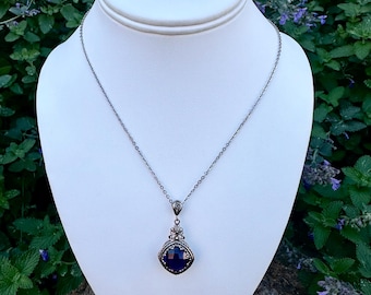 Beautiful natural amethyst and sterling silver filigree pendant and adjustable sterling silver chain