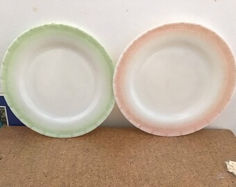 Macbeth-Evans vintage 1930’s, ‘40’s dinner plates 9 inches, Oxford Cremax glass one pink and one green border, very rare. Price is for both.