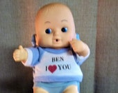Vintage Uneea Kewpie Doll 70947 Little Boy Sitting in His Wicker Chair. 8 1 2 quot Tall