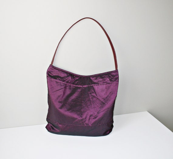 purple shoulder bags