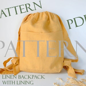 May include: A PDF pattern for a linen backpack with a lining. The backpack is a light yellow colour and has a drawstring closure. The pattern includes instructions for making the backpack.