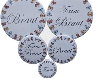 Braut, Team Braut, Hochzeit Button Schmetterling 59 mm mit Magnet