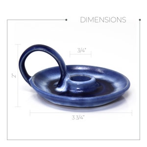 May include: Blue ceramic candle holder with a handle. The holder measures 3 3/4 inches in diameter and 2 inches tall.