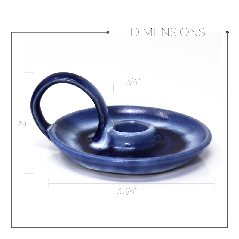 May include: Blue ceramic candle holder with a handle. The holder measures 3 3/4 inches in diameter and 2 inches tall.