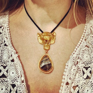 Lion pendant with black onyx stone