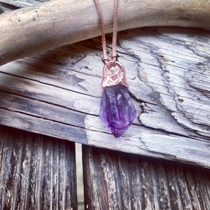 Small amethyst raw crystal pendant