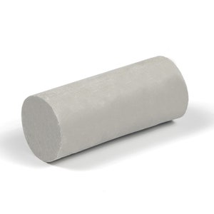May include: A grey cylindrical foam roller for exercise and physical therapy.