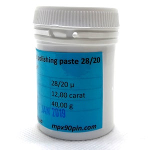 May include: A white plastic jar with a blue label that says "polishing paste 28/20". The label also includes the text "28/20 μ", "12,00 carat", "40,00 g", "JAN 2019", and "mpx90pin.com".