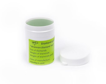 Pode incluir: Um recipiente cilíndrico branco com interior verde e tampa branca separada. O recipiente tem um rótulo verde com texto preto que diz "Ukrainian Diamond Tool". O texto também inclui o tamanho e o peso dos diamantes.