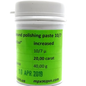 May include: A green and white container labelled "Diamond polishing paste 10/7 increased 10/7 μ 20,00 carat 40,00 g 10 APR 2019 mpx90pin.com"