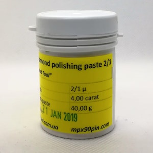 May include: A white plastic jar with a yellow label that reads "Diamond polishing paste 2/1", "Ind Tool", "2/1 μ", "4,00 carat", "40,00 g", "21 JAN 2019", "mpx90pin.com", and "l.com.ua".