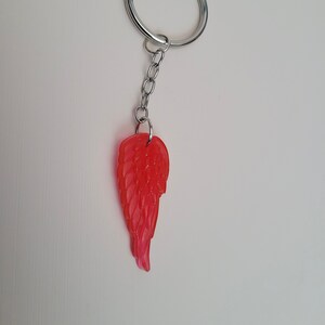 Red Wing Resin Keychain - red feather - bird