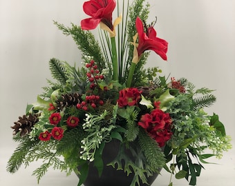 Artificial Red centerpiece! Lasts forever and looks nearly natural, red winter floral arrangement
