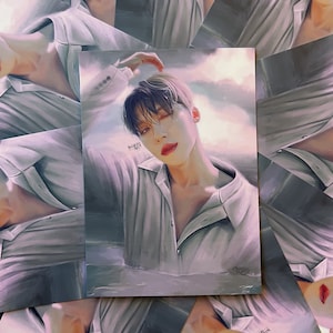 May include: A close-up of a man with dark hair and a white shirt. He is looking at the camera with a soft expression. The background is a light blue sky with white clouds. The image is a digital painting.