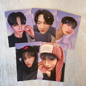 May include: Set of four illustrated postcards featuring portraits of young men with black hair. Each portrait has a different background color and features a different hat or headwear. The text "Loverboy" is visible on one of the postcards.