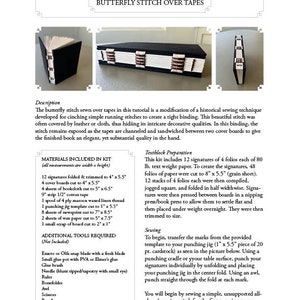 May include: A close-up of a bookbinding tutorial showing a book with a black cover and a white spine. The book is bound with a butterfly stitch over tapes. The tutorial includes a list of materials and tools needed for the project. The text includes the title "Butterfly Stitch Over Tapes".