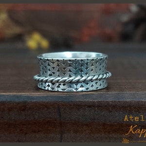 Knit pattern spinner ring, sterling silver, with a twisted sterling spinner, spinning ring, meditation ring, anti-stress ring. Fidget ring.