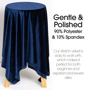 May include: A navy blue velvet tablecloth draped over a wooden table. The tablecloth is made of 90% polyester and 10% spandex. "Gentle & Polished" is written in white text on the right side of the image.