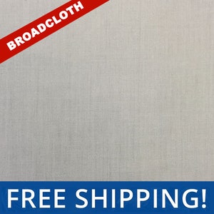 May include: A close-up of a light gray broadcloth fabric. The fabric has a subtle texture and a smooth finish. The text "BROADCLOTH" is printed in red on a diagonal across the top of the image. The text "FREE SHIPPING!" is printed in white on a blue background at the bottom of the image.