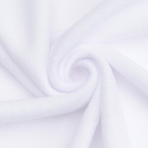 May include: Close-up of white fabric with a soft, plush texture. The fabric is arranged in a spiral pattern, creating a sense of depth and dimension. The material appears to be a soft, fluffy textile.