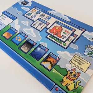 May include: A rectangular playmat with a blue border and a sky-themed background. The mat features a game interface with windows, cards, and a cartoon cat. Text includes "Creature," "Land," and a speech bubble saying "Looks like you're trying to play some Magic."