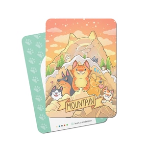 May include: A digital illustration of a mountain with a group of cartoon cats and dogs on it. The mountain is brown and has a snowy peak. The sky is orange and pink. The text "MOUNTAIN" is written on a yellow banner.