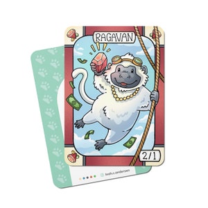 May include: A cartoon illustration of a white monkey with a red jewel in its hand, wearing a gold necklace and goggles, and holding onto a rope. The monkey is flying through the air with money falling around it. The card reads "Ragavan" and "2/1".