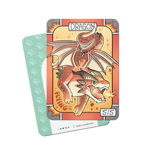 May include: A card game card with an orange and red dragon illustration. The card is titled "Dragon" and has the text "Flying" and "5/5" on it.