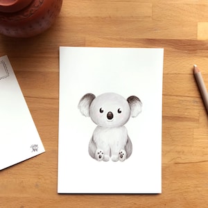 Koala sur carte postale pouvant également servir de petit affiche décorative, illustration dessinée par Jaune Pop à Montréal