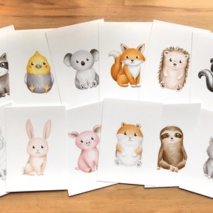 Ensemble de 12 Cartes Postales ou Affichettes 5 x 7 représentant chacune un animal différent illustrées par Jaune Pop à Montréal