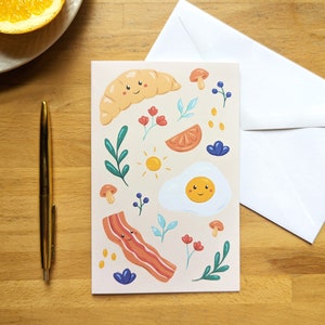 Ontbijtwenskaart met croissant, spek en ei, geïllustreerd door Jaune Pop, inclusief envelop, voor verjaardag, bedankje en meer