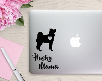 May include: Black and white silhouette of a husky dog with a heart on its chest. The text "Husky Mama" is below the dog.