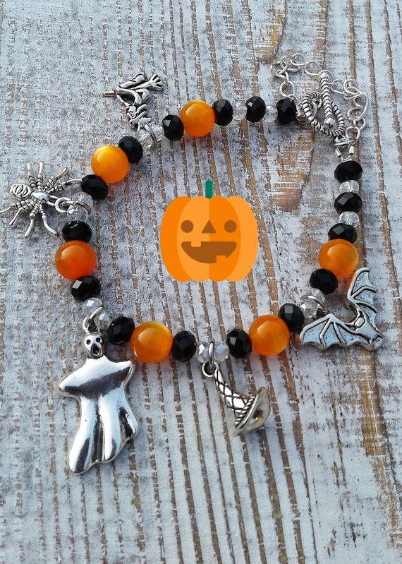 18 Halloween Accessories for a Little Everyday Spookiness 19 Orange Beads and Spooky Charms