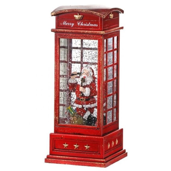 サンタクロースのいるヴィンテージの電話ボックスのスノードーム