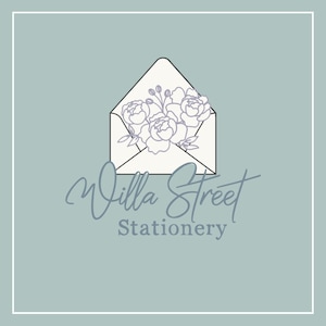 a white envelope with a bouquet of flowers on it