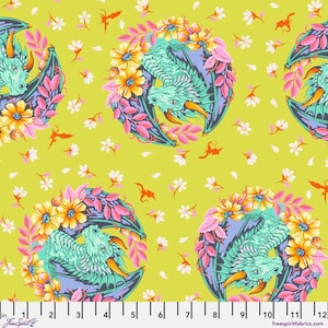 May include: Fabric with a repeating pattern of teal dragons encircled by pink and yellow flowers on a chartreuse background. Small white flowers and orange accents are scattered throughout the design. The fabric has a whimsical, fantasy theme.
