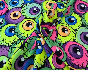 New Neon eye balls print on best quality of nylon spandex 4-way stretch 58/60” Sold by the YD. Ships Worldwide from L.A CA-