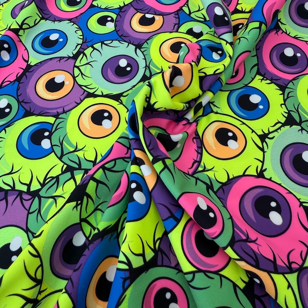 New Neon eye balls print on best quality of nylon spandex 4-way stretch 58/60” Sold by the YD. Ships Worldwide from L.A CA-