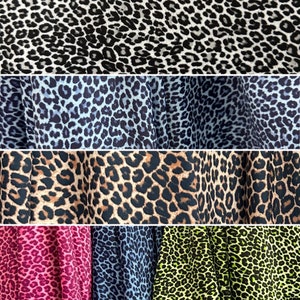 Cheetah print on nylon spandex fabric 4 way Stretch. Sold by the yard. Animal print( leopard print) 5 colors available