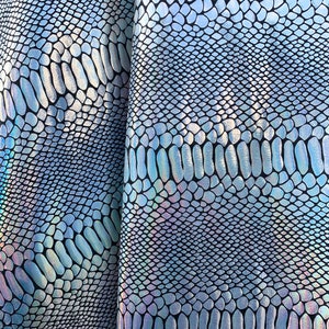 Silver Iridescent Snake Print on Black Spandex Fabric 4 way Stretch. Fabric sold by the yard
