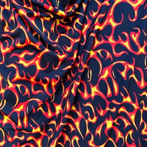 Flames Red/Yellow  print on best quality of black nylon spandex 4-way stretch 58/60” Sold by the YD. Ships Worldwide from L.A CA-
