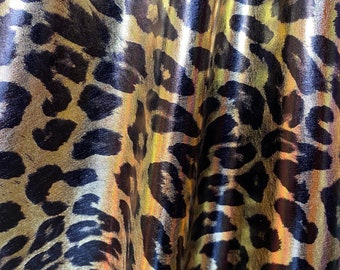 NEW Foil Cheetah Print on Poly Spandex Fabric sold by yard [Shinny Foil Fabric - Gold/Black 2 way  Stretch Poly Spandex Fabric