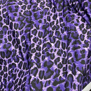 Purple Leopard print tie dye purple spandex fabric 4 way Stretch. Sold by the yard. Animal print( leopard print) 60” wide