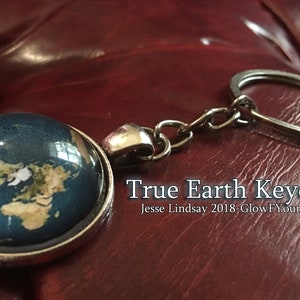 True Earth Keychain! Show the whole world you're woke af, unlock the flat out lies, jangle the keys of truth!