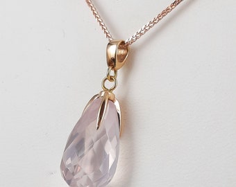 Rose quartz pendant necklace in 14k rose gold