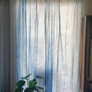 Set of two blue hand painted  coastal curtains inspired by the swirls of the ocean